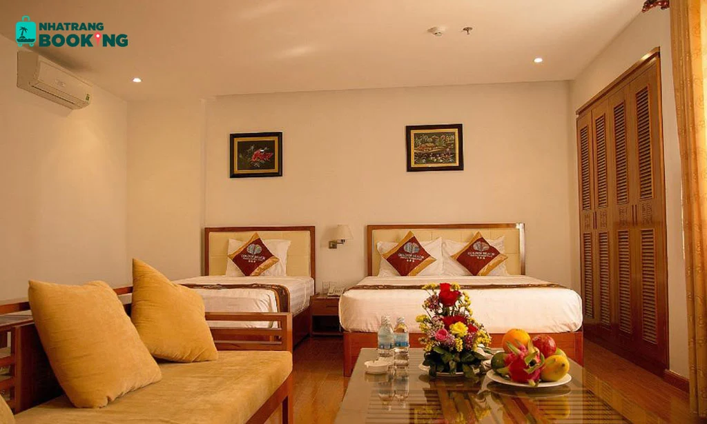 Phòng gia đình có hai giường tại Golden Beach Nha Trang Boutique Hotel