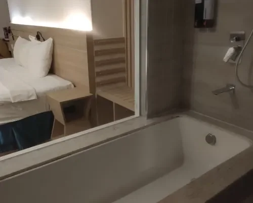 Bồn tắm trong phòng tại Lucky Sun Hotel Nha Trang Beach